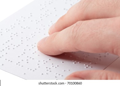 Close Up Of Male Hand Reading Braille Text