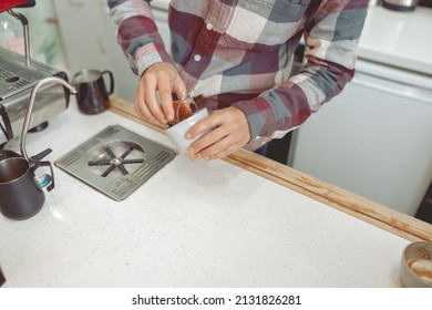 Close up of male hands of barista preparing coffee - Powered by Shutterstock