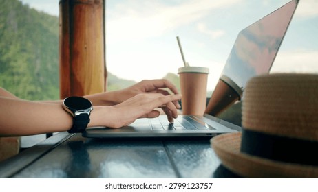 Close up of male hands typing programming on screen laptop Camera slides around
