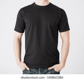close up of man in blank t-shirt - Shutterstock ID 140861086