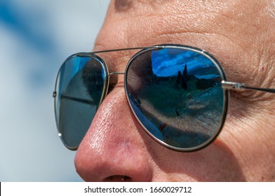 Close Up Of Man With Blue Sunglasses