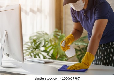 Close Up Man With Cloth Cleaning Working Desk Table.