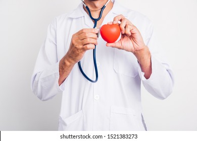 Close up Man doctor with stethoscope he is holding red heart on hand isolate on white background - Shutterstock ID 1521383273