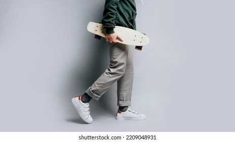 Close Up A Man Feet With His Skates And His Shoes In Isolated Background