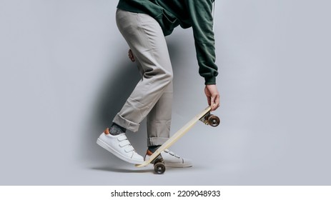 Close Up A Man Feet With His Skates And His Shoes In Isolated Background