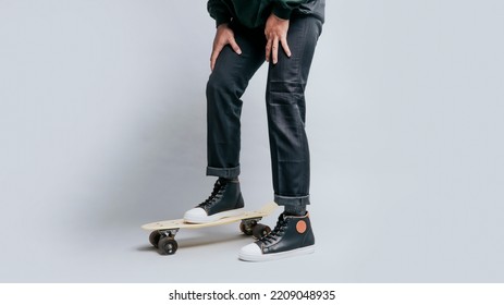 Close Up A Man Feet With His Skates And His Shoes In Isolated Background