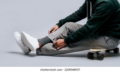 Close Up A Man Feet With His Skates And His Shoes In Isolated Background