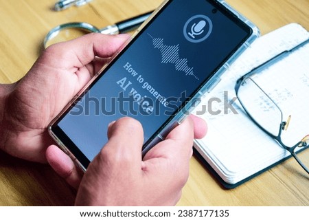 Close up of a man hand holding his smartphone screen showing message how to generate AI voice. Selective focus, generative artificial intelligence concept.