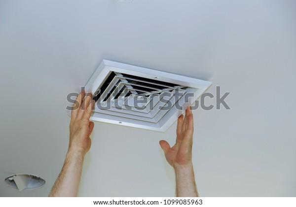 Close Man Hand Installing Vent Cover Stock Photo Edit Now 1099085963