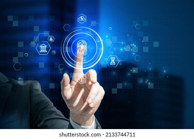 Close up of man hand pointing at abstract glowing id fingerprint web protection and security interface on blurry blue bokeh city background. Identification, cybersecurity and privacy concept. 