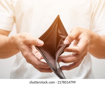 Close Up Man Hand Show Empty Wallet No Money,poor Man Show No Money In Wallet