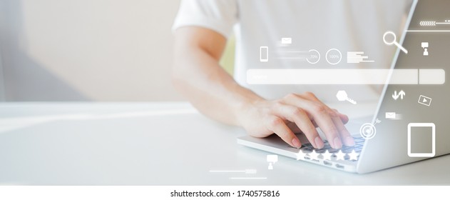 close up man hand type on keyboard laptop to use search engine optimization (SEO) tools for finding customer or promote and advertise about content online for marketing technology and business concept - Shutterstock ID 1740575816