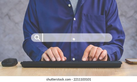 Close Up Of Man Hand Using Computer Keyboard To Searching Information On Web Browser With Search Bar Virtual Screen Interface