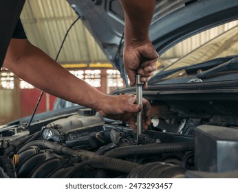 Close up Man hands fixing Car machinery vehicle mechanical service. Mechanic man hands repairing car auto repair shop. open vehicle hood checking up auto mobile. Vehicle Car maintenance engineer. - Powered by Shutterstock