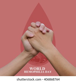 close up man handshake on blood drop for World Hemophilia Day concept:Elements of this image furnished by NASA