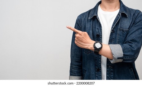 Close Up Man Jeans Shirt Point Finger At Copy Space Isolated