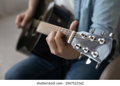 Close Up Man Playing Acoustic Guitar, Talented Artist Musician Making Music, Songwriting, Working On New Song, Using Musical Instrument, Student Practicing At Lesson, Hobby Passion Concept