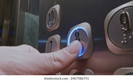 Close up of man pressing elevator button of the eight floor. Stock clip. Finger presses the elevator button. - Powered by Shutterstock