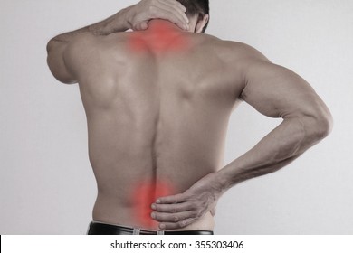 Close Up Of Man Rubbing His Painful Back. Pain Relief,  Chiropractic Concept