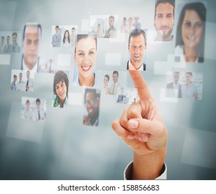 Close up of a man selecting a profile picture on digital screen