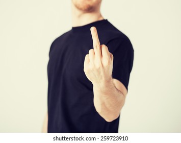 Close Up Of Man Showing Middle Finger