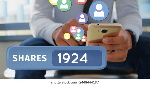 Close up of a man sitting in the office while checking on his phone. Bellow his phone in the foreground is a shares count bubble with follower icons flying upwards