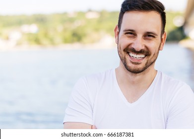 Close Up Of A Man Smiling Outside