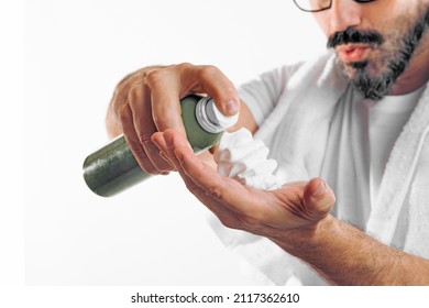 Close Up Of Man Spraying Beard Foam On His Hand. Get Ready. Horizontal Shot On White Background. Man With Moustache