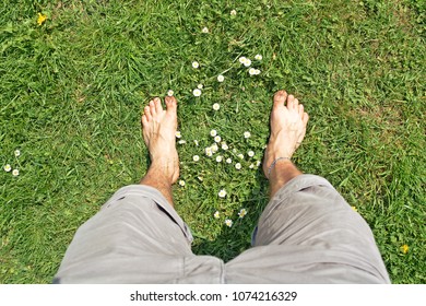 Close up - Man is standing in a meadow