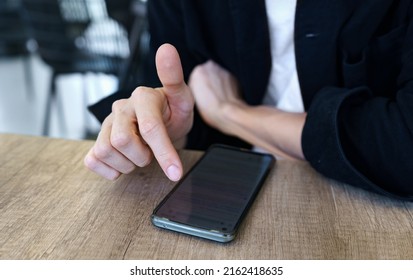 Close Up Of Man Tapping Phone Screen, Searching The Internet, Scrolling Social Media Feed.