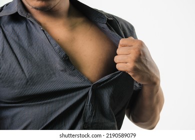 Close Up Of A Man Tearing Clothes He Is Wearing With His Left Hand Isolated White Background, Angry Expression.