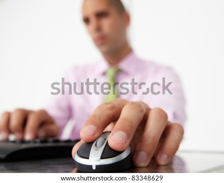 Close up man using  keyboard and mouse