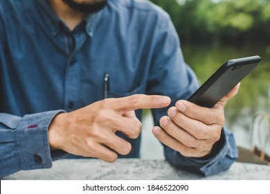 Close up man using mobile smart phone ,business, people, cellphone, touchscreen, touchphone, cell, businessman, smartphone, phone, telephone, lifestyle, technology, device - Shutterstock ID 1846522090
