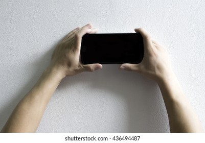 Close up of man using mobile smart phone
