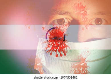 Close up of a man wearing a mask with a fear expression, with an Indian flag and virus cells as background. Concept of Corona Virus India.  - Powered by Shutterstock