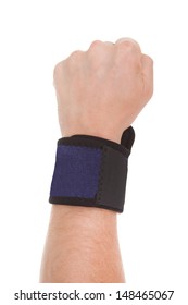 Close Up Of Man Wearing Wrist Band In Hand Over White Background