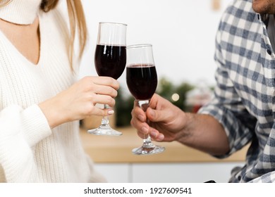 Close Up Of Man And Woman Drinking Red Wine