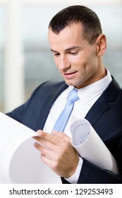 Close up of manager with draft. Concept of successful construction