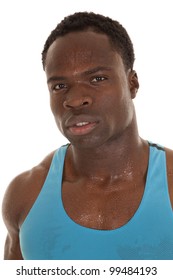 A Close Up Of A Man's Face With Sweat Dripping Off Of His Face.