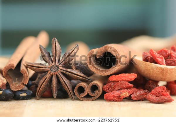 Close up\
many kind of Chinese herb, wood\
background.