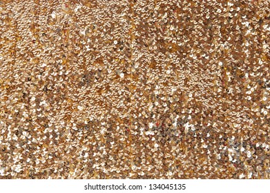 Close Up Of Many Shiny Gold Sequins