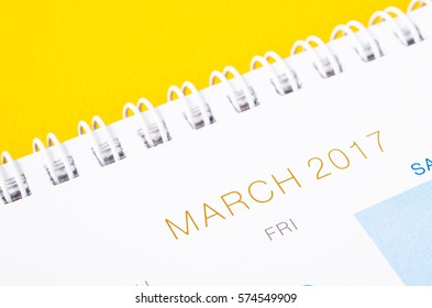 Close Up March 2017 Calendar Page On Yellow Background.