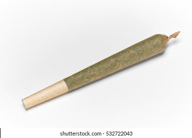 Close up of marijuana joint on white background