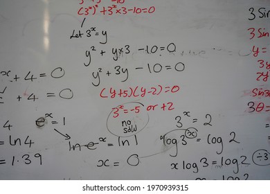 Close up of math, graphs and equations on a white board