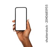 Close up of mature african hand holding smartphone with blank screen isolated on while background. Black woman showing empty screen of modern cellphone. Mature hand showing white screen of smart phone