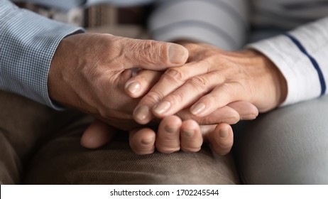 Close Up Mature Couple Holding Hands, Loving Caring Wife Supporting Comforting Senior Aged Husband, Family Expressing Empathy And Understanding, Trusted Relationship In Marriage