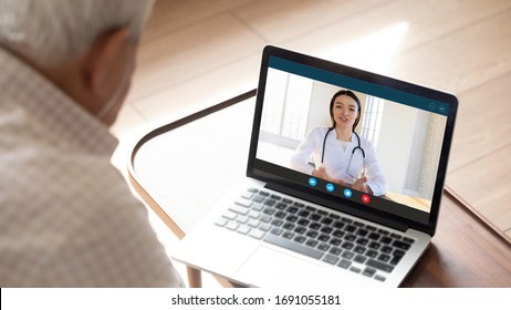 Close up of mature man have video call consult with female nurse using laptop webcam, elderly male patient sit at home talk speak with doctor or physician, discuss symptoms with gp on computer online - Shutterstock ID 1691055181