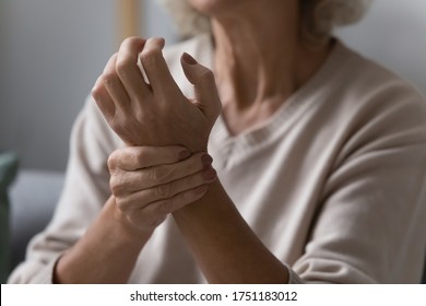 Close Up Of Mature Woman Do Daily Checkup, Check Pulse On Wrist At Home, Sick Elderly Female Feel Unhealthy Unwell Hold Touch Hand Measure Heart Rate, Tachycardia, Elderly Healthcare Concept