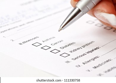 Close up of a medical history questionaire - Shutterstock ID 111330758