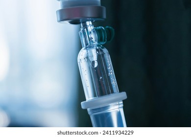 Close up medical intravenous IV drip in hospital background - Powered by Shutterstock